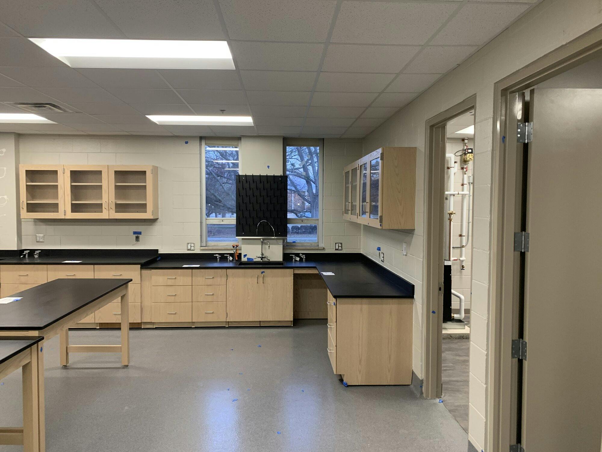 Additional view of lab leading into two additional work spaces.