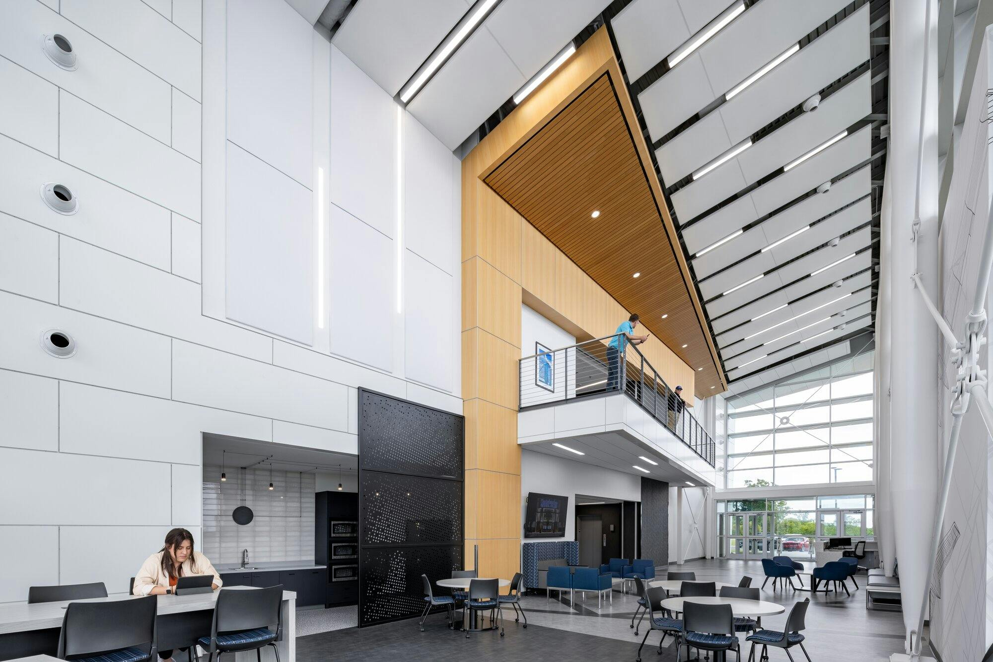 Opposite end of front lobby with multiple seating areas for studying and lounging. 