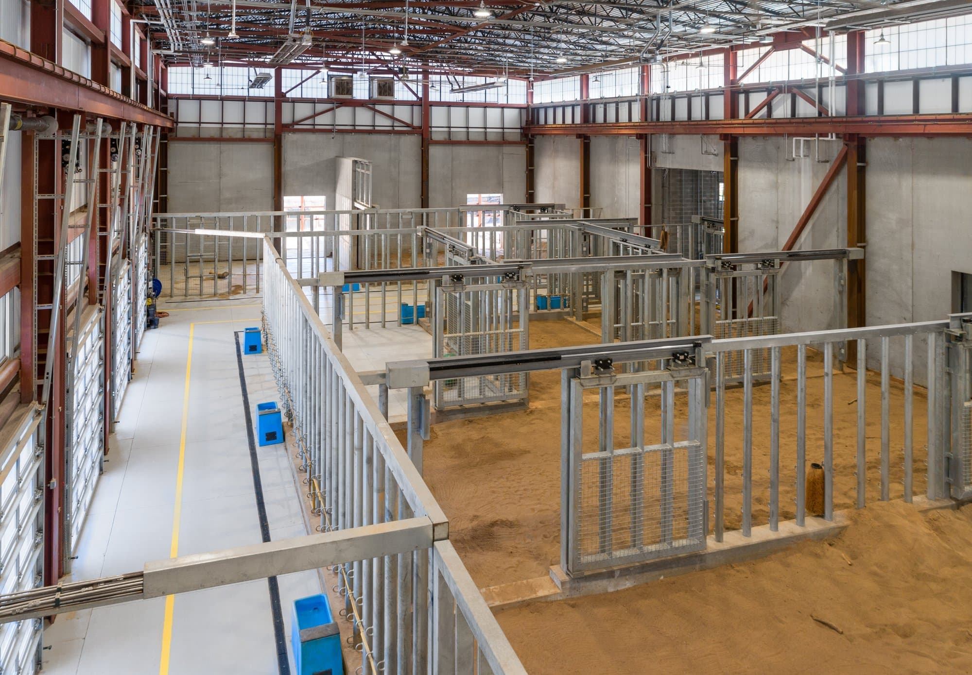 interior of the atlanta zoo elephant barn with gated pens for individual elephants