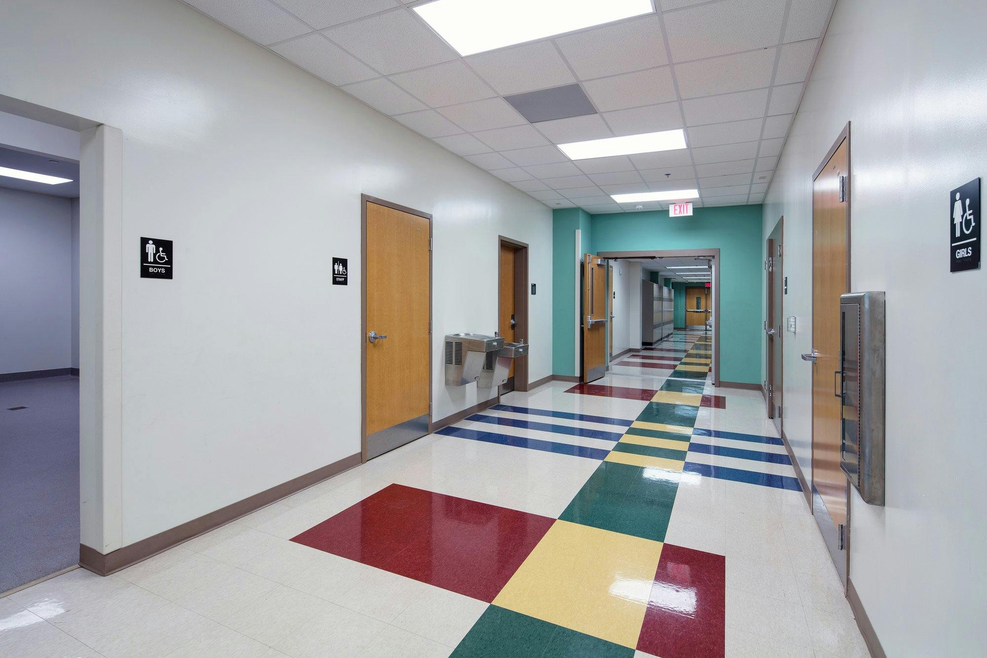 Multi-color patterned tile floors line the hallway of Long Middle School.
