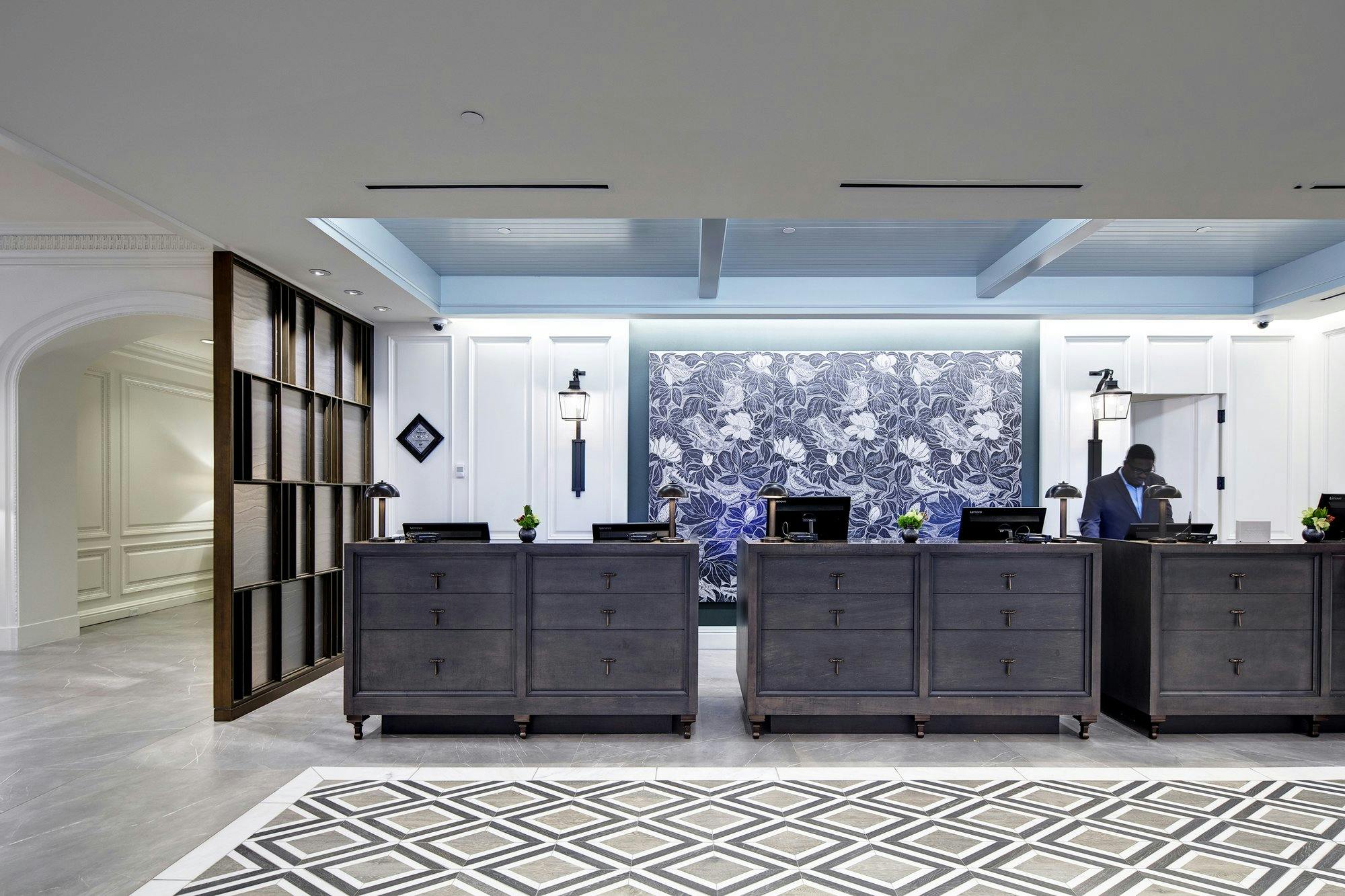 Hotel entryway and reception desk.