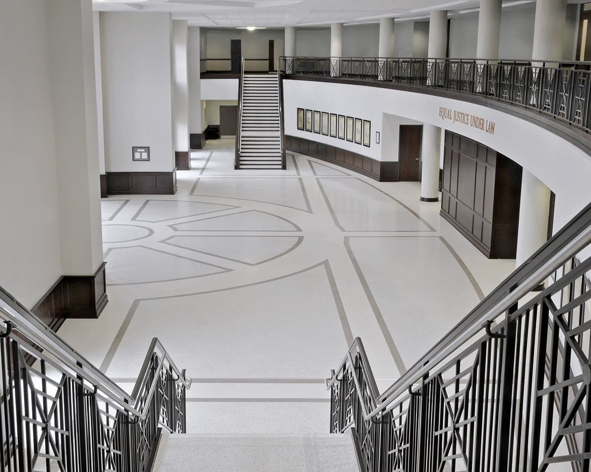 Looking down a stairwell to an open entryway.