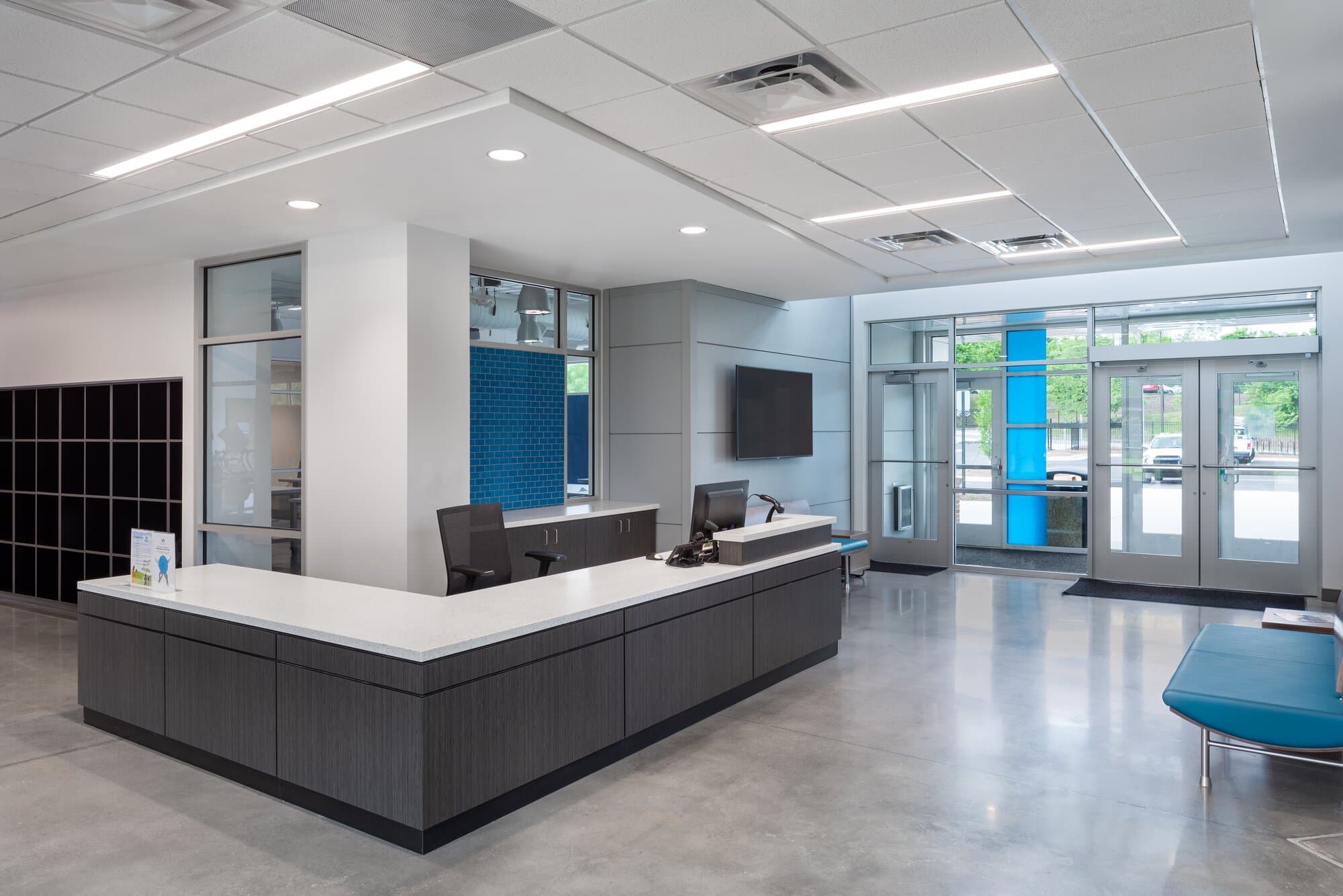 Lobby with seating, desks, and waiting area.