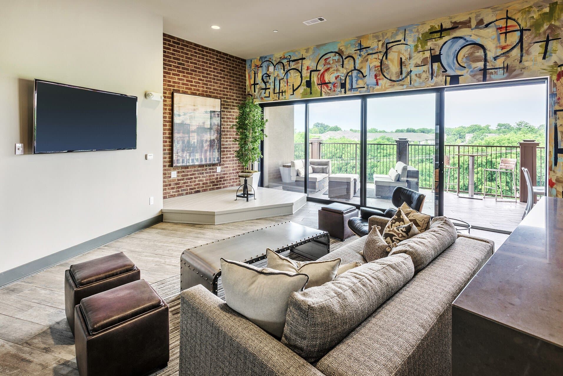 Resident lounge with seating and stage.