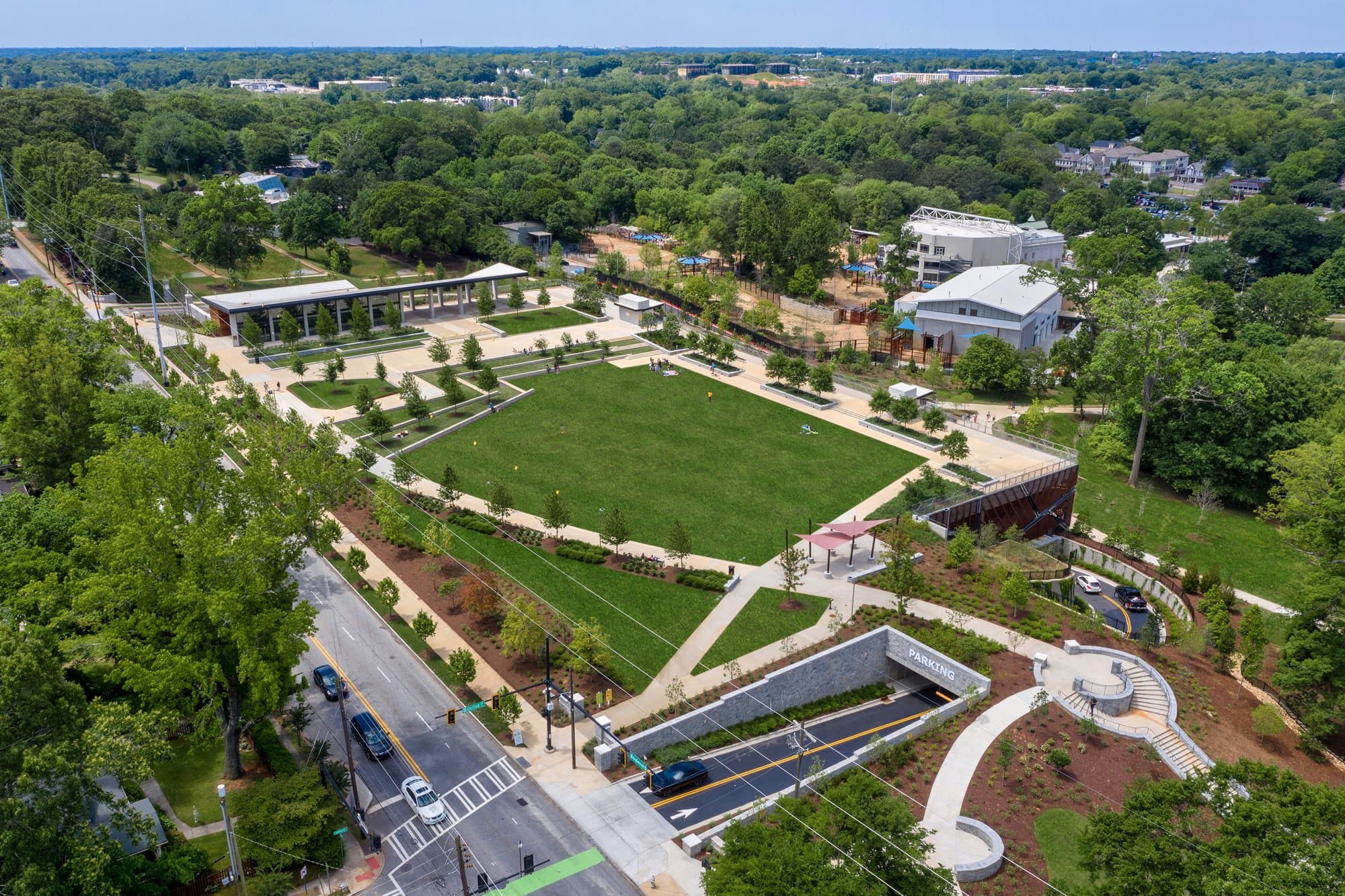 Areial image of grassy park area above parking deck.